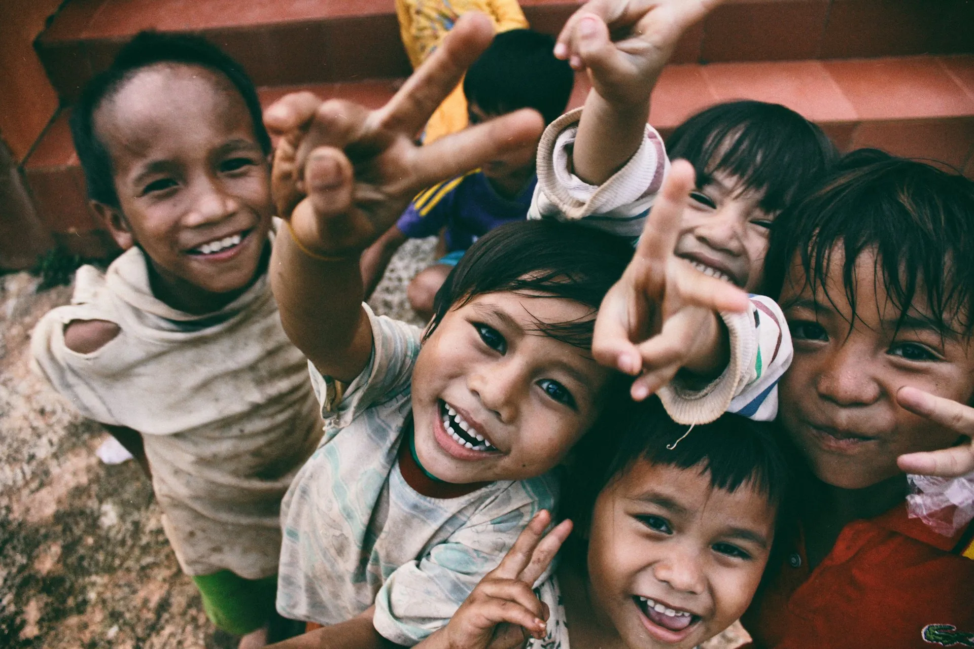 Smiling children from a community supported by the Shivasha Foundation