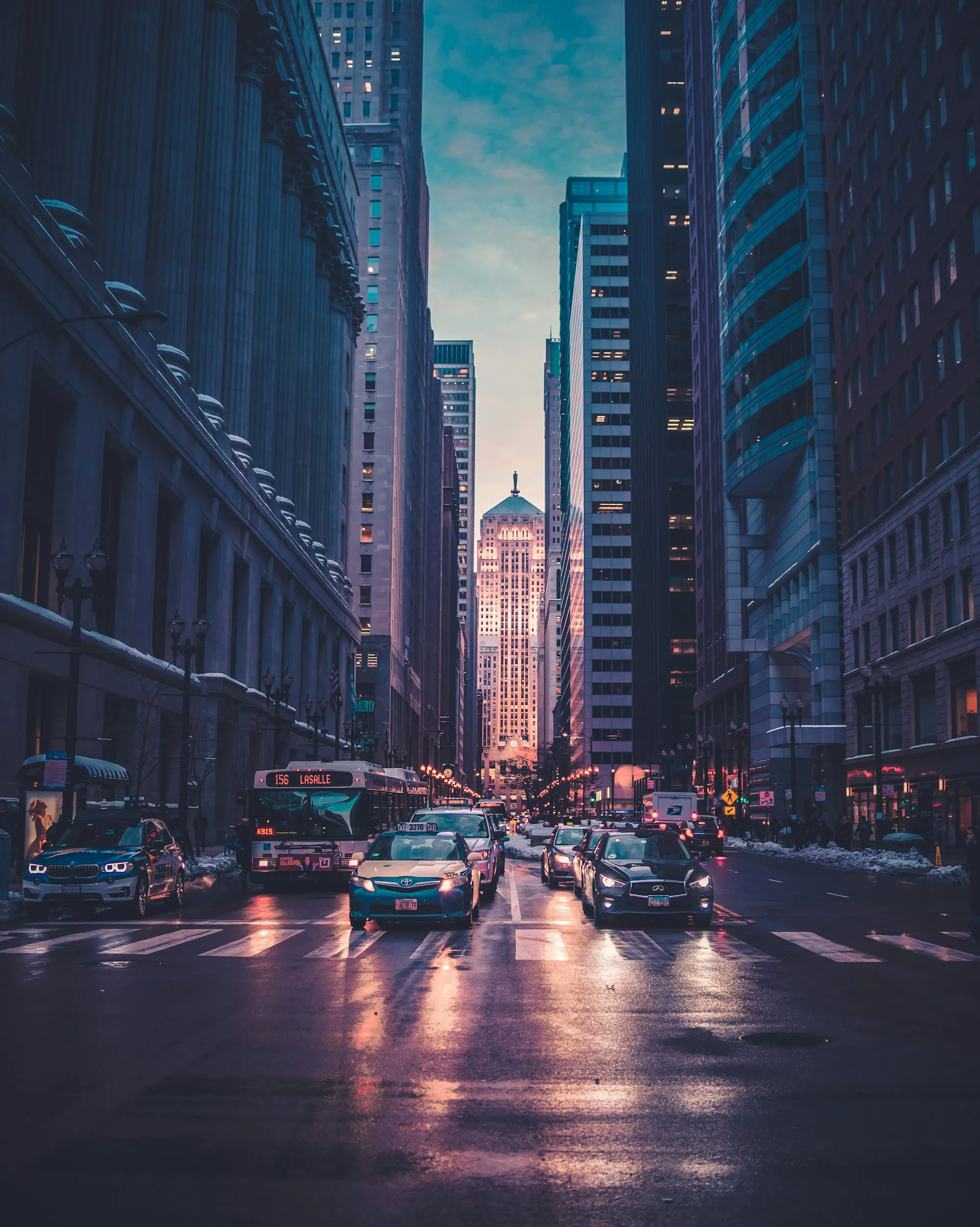 A modern city of towers at blue hour